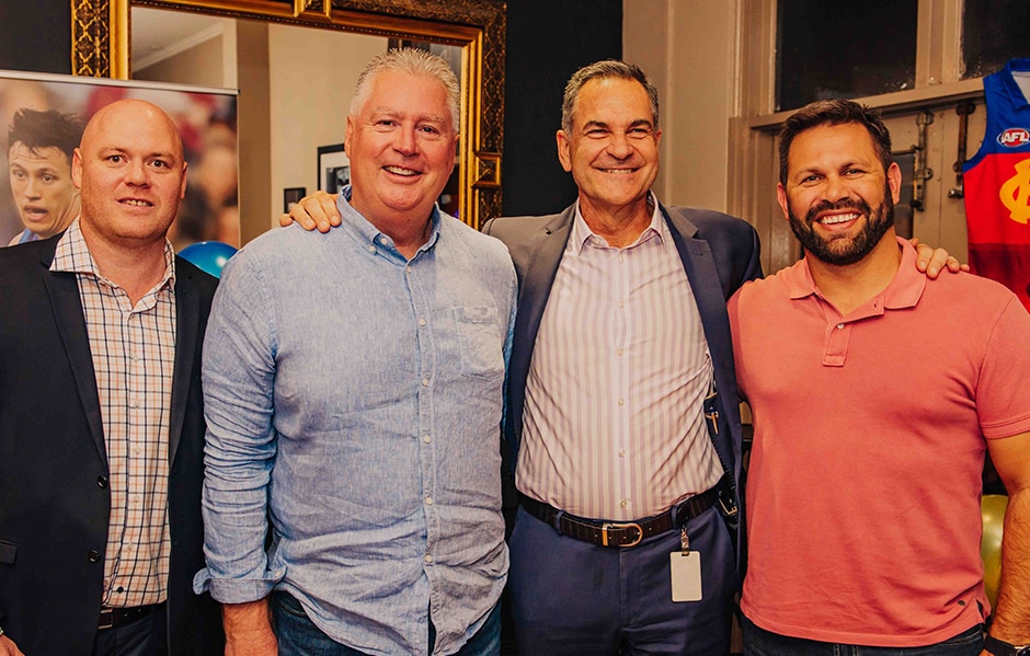 web 1unitingthepridelions0291.jpg (L-R): Shaun Mugavin (MC), Greg Swann, Laurie Serafini, and Chris Johnson. - Brisbane Lions